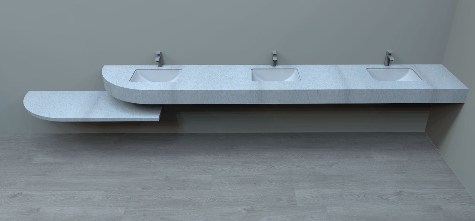 Floating solid-surface restroom counter with three sinks and a lowered ADA section
